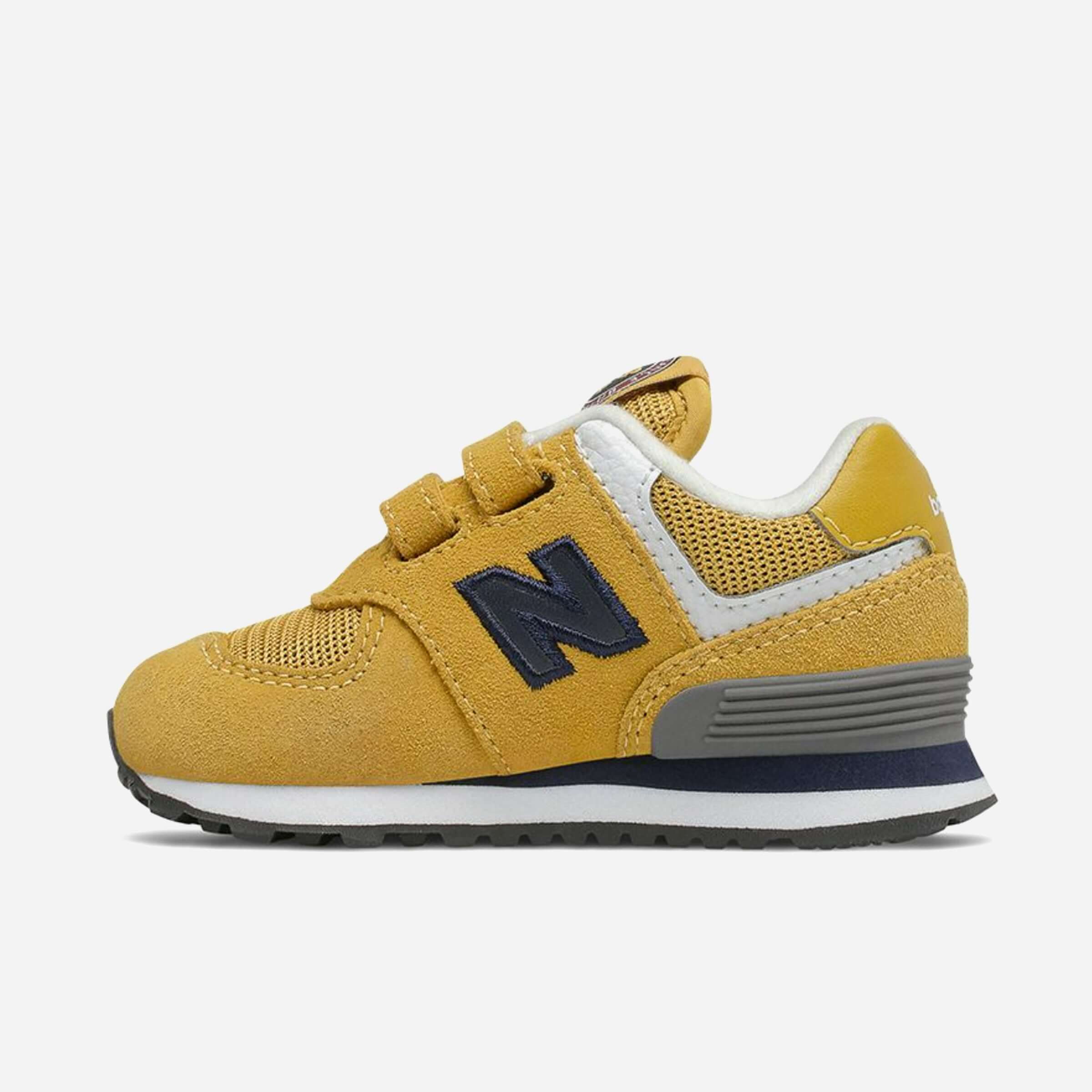حذاء رياضي للأطفال باللون الأصفر من نيو بالانس 574