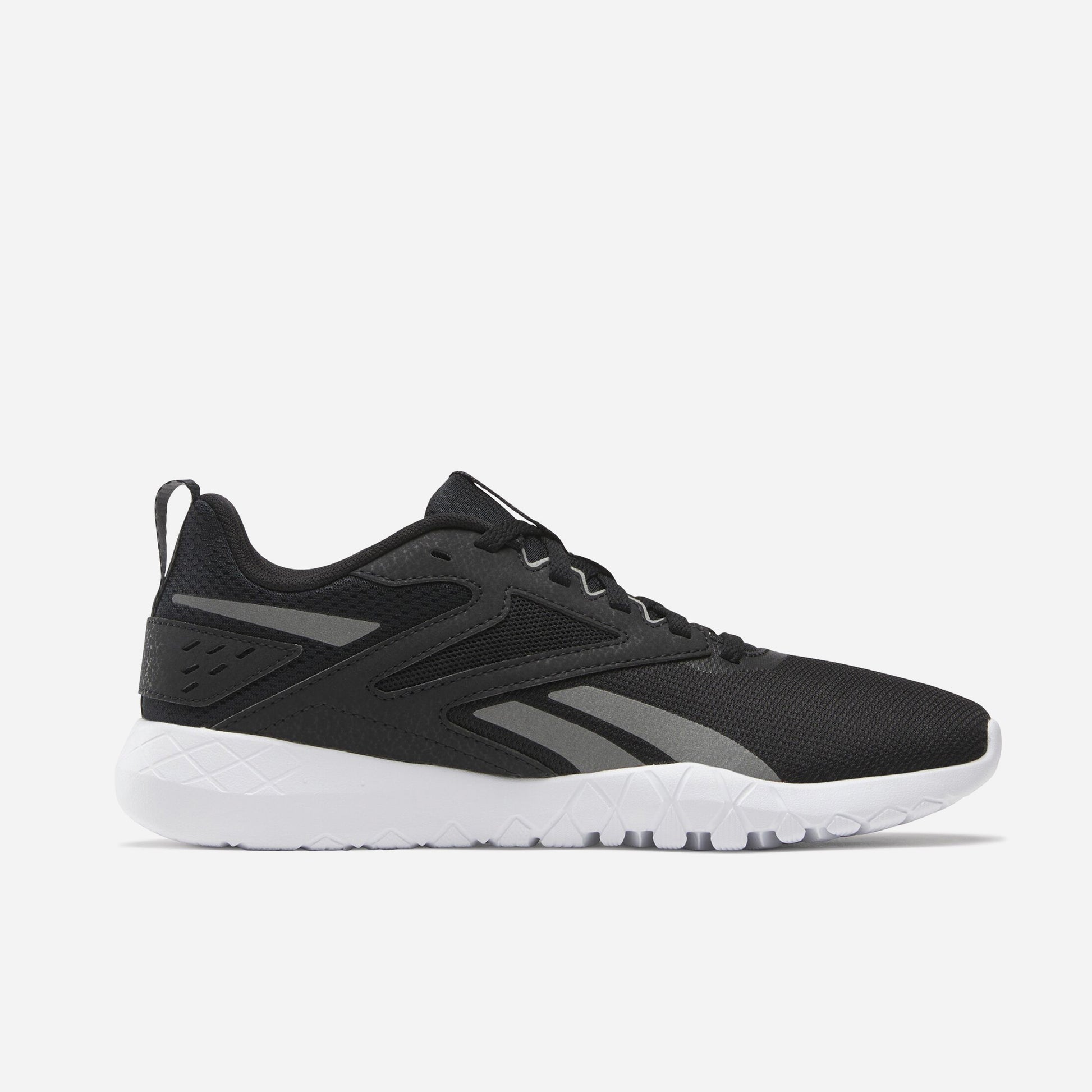 Reebok Flexagon Energy TR 4 Chaussures De Running en noir avec semelle blanche, conçues pour confort et performance.