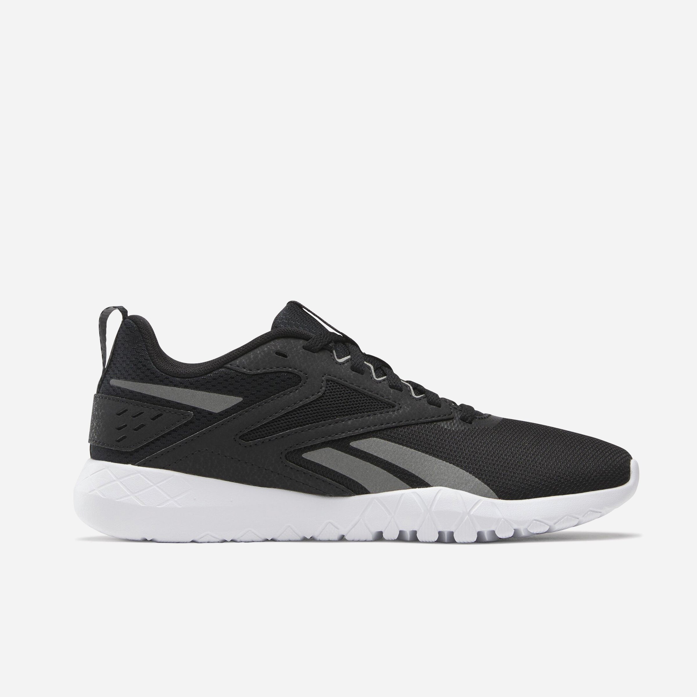 Reebok Flexagon Energy TR 4 Chaussures De Running en noir avec semelle blanche, conçues pour confort et performance.