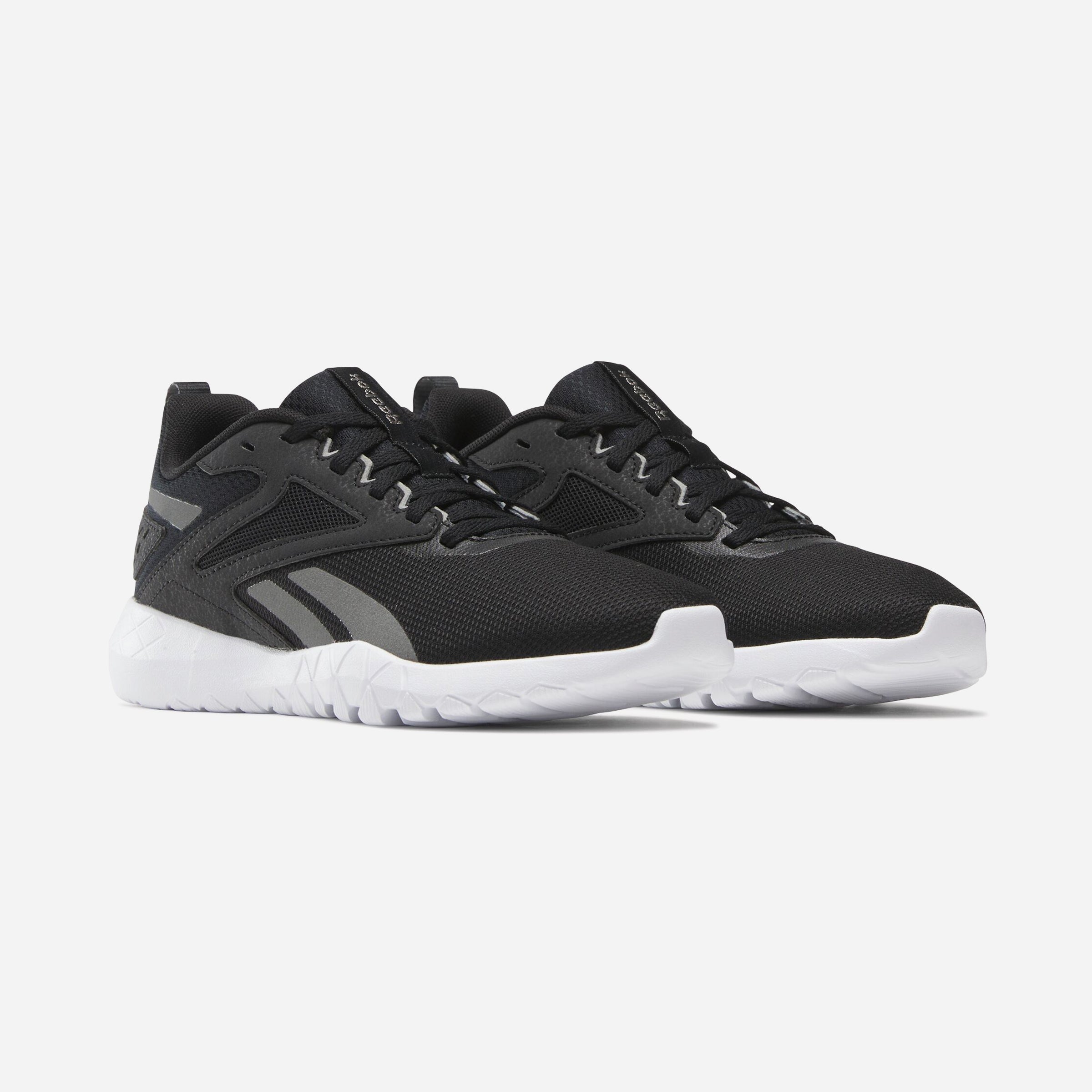 Reebok Flexagon Energy TR 4 Chaussures De Running en noir, offrant confort et performance pour vos entraînements.