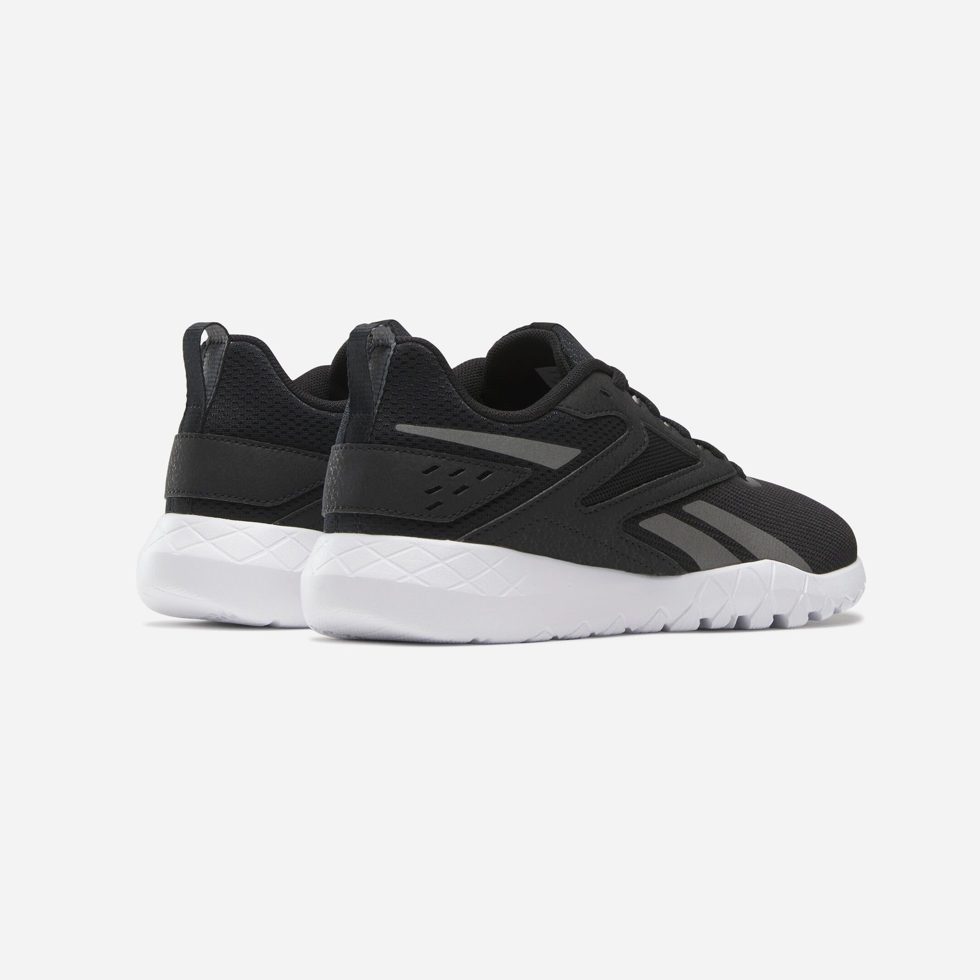 Reebok Flexagon Energy TR 4 Chaussures De Running vue arrière avec semelle blanche et design noir.