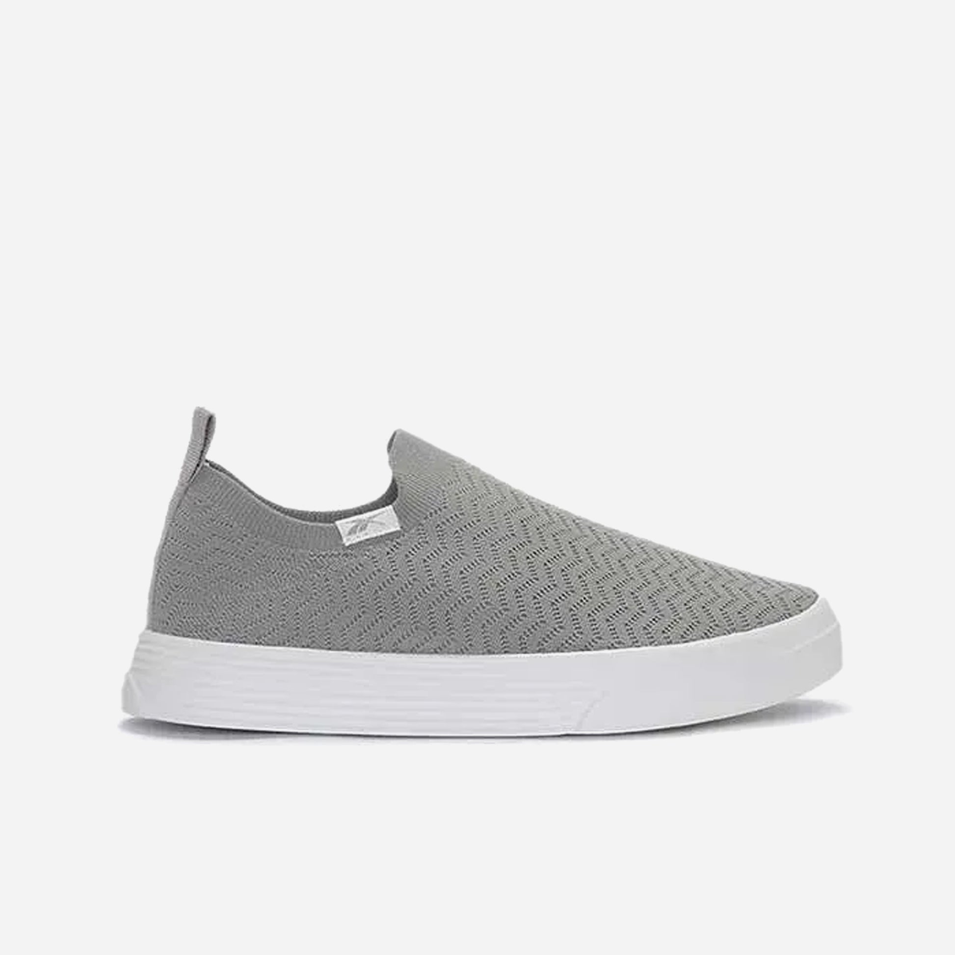 Reebok Onlux Chaussures Sans Lacets grises avec semelle blanche pour un style moderne et quotidien.
