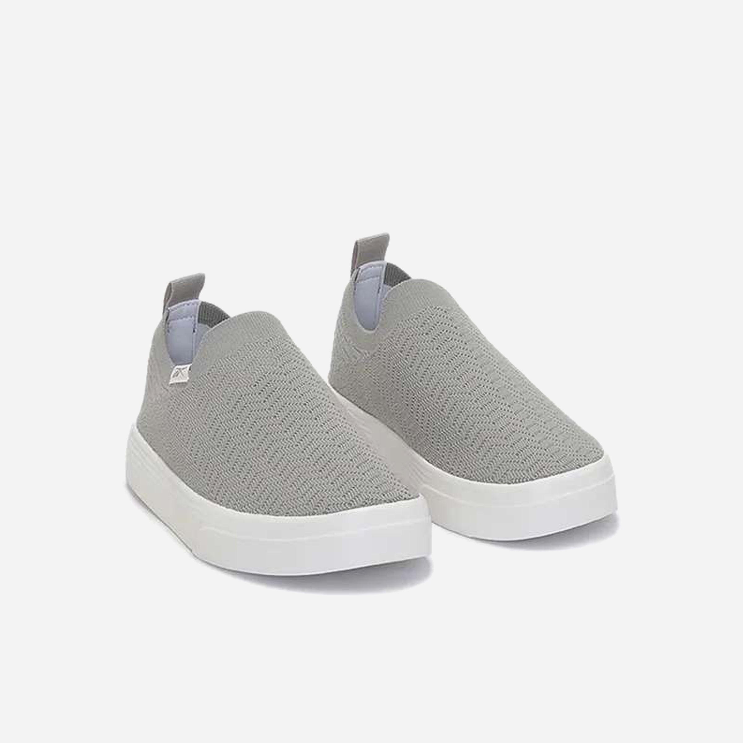 Reebok Onlux Chaussures Sans Lacets en gris avec design moderne et confortable pour un usage quotidien.