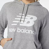 New Balance women's oversized pullover hoodie in grey with stacked logo, featuring a comfortable kangaroo pocket.